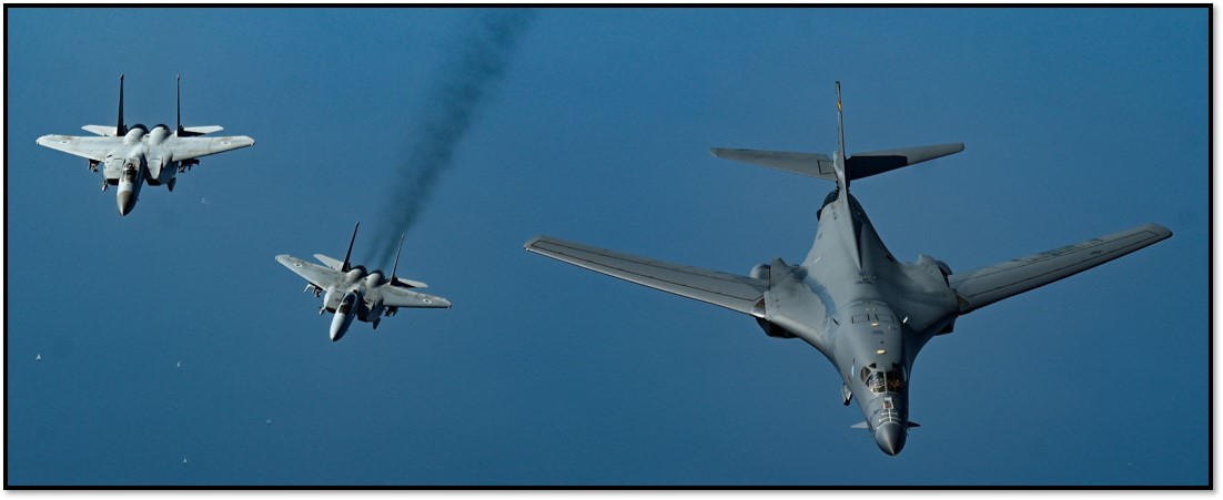Israeli F-16s escort a U.S. B-1 bomber